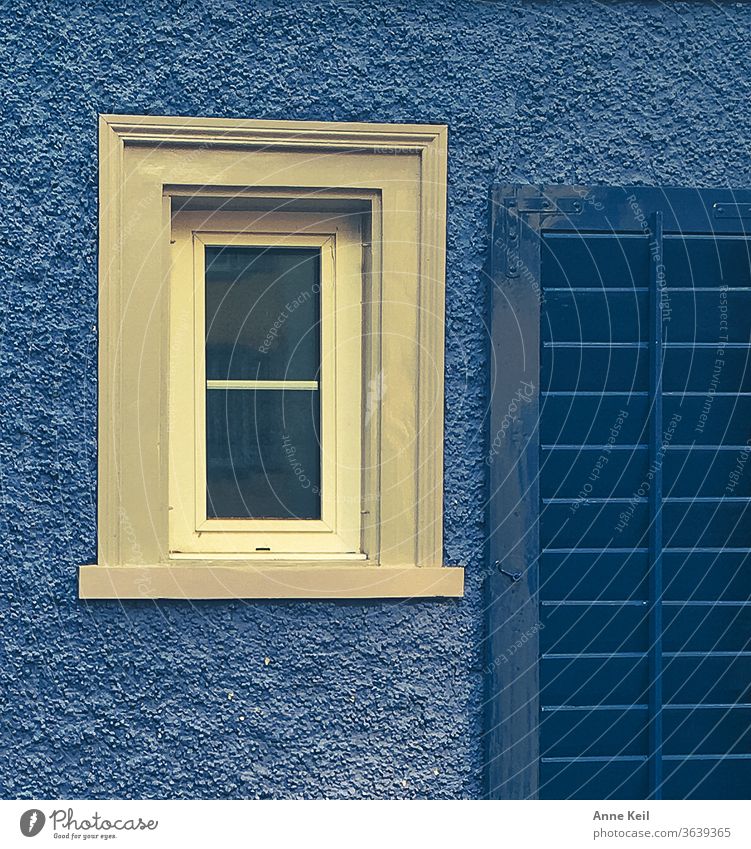 Blue facade with white window Facade House (Residential Structure) Window Exterior shot Wall (barrier) Colour photo Deserted Shutter White