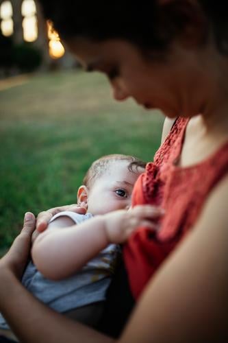 Mother nursing outdoor motherhood Baby breastfeed Nursing Together togetherness Parents Caucasian Infancy Happy Hold Family & Relations Child Love Feeding