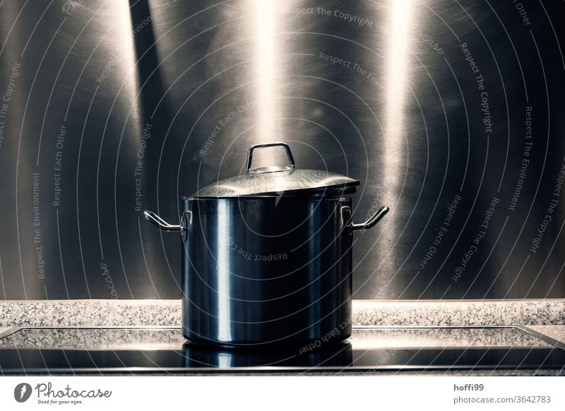 large pot on stove with lots of stainless steel around it saucepan soup pot Soup Cooking boil Stew Lunch