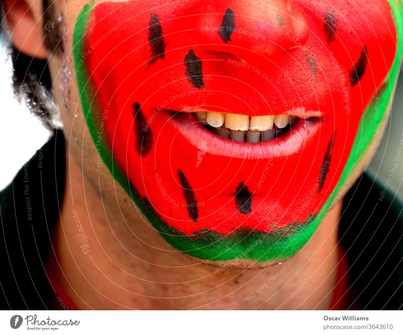 Watermelon face man. watermelon colors men male adult people smiling happy