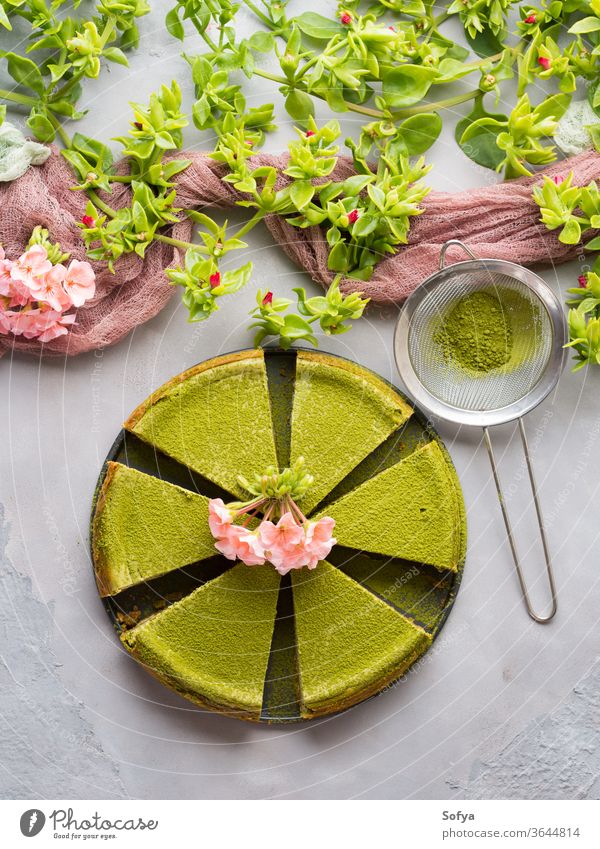 Matcha cheese cake and flowers matcha green tea dessert food sweet cream bakery gourmet healthy pastry baked tasty decoration delicious homemade plate slice