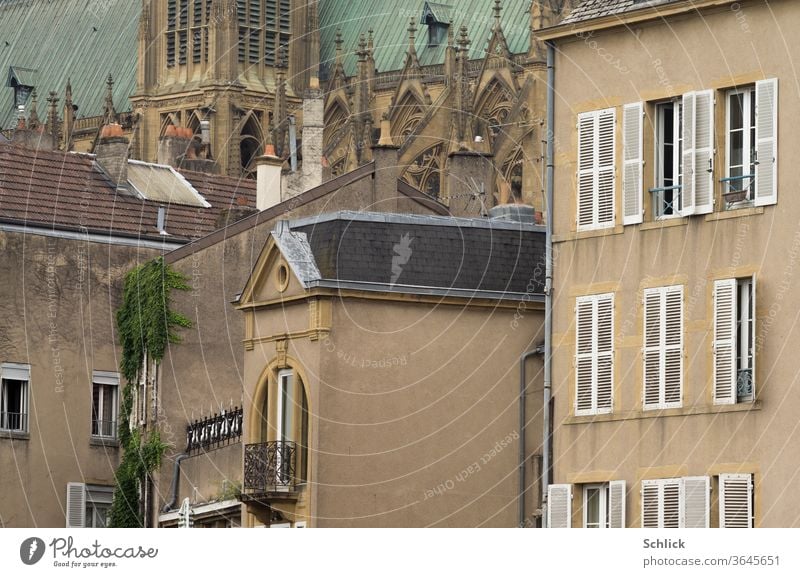 Houses and cathedral in Metz Teleperspective houses Cathedral metz Lorraine France Quai Paul Vautrin roofs Window Gothic period gothic Facade