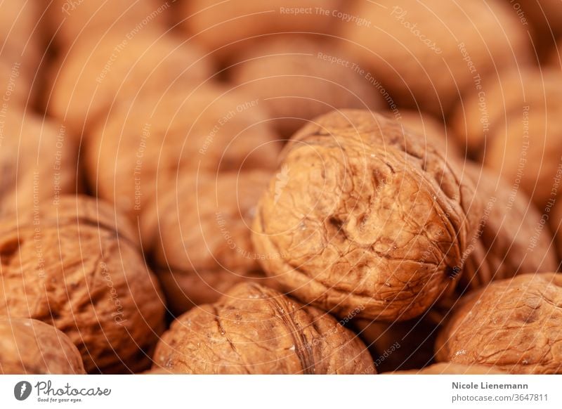 walnut on a wooden background snack cracked diet natural nature kernel brown food nutshell healthy open fruit rustic protein vegetarian season organic table