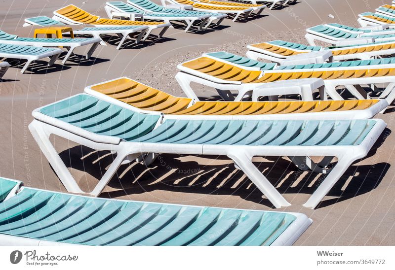 Empty deckchairs on the beach Folding tables Folding chairs Lie Free Sand Beach Ocean North Sea Baltic Sea Vacation & Travel Tourism Deserted Relaxation