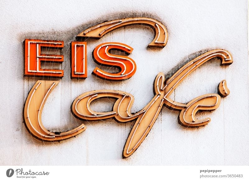 Ice Cafe Neon sign neon sign Colour photo Exterior shot Characters Letters (alphabet) Typography Signs and labeling Wall (building) Facade Word Wall (barrier)