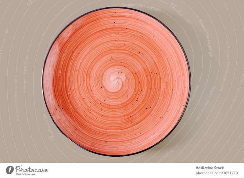 Empty pink colored bowl with spherical print craft round dishware ceramic tableware utensil kitchenware porcelain container serve spiral design artwork fragile