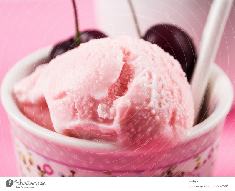 Strawberry ice cream cups with cherries, macro strawberry scoop ball gelato red cherry berries sundae yogurt sweet fruit temptation topping food garnish dessert