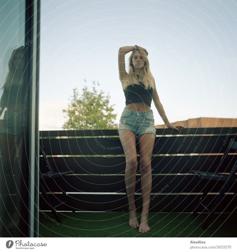 analogue full body portrait of a young, blond, barefoot woman on a balcony Woman Young woman Blonde already Slim Long-haired Esthetic Summer Beautiful weather