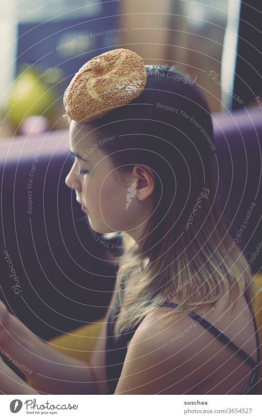 teenagers with a bun on their head girl Youth (Young adults) youthful Strange Whimsical Hat Roll Headwear Sesame seed roll Profile hair Face Hair and hairstyles