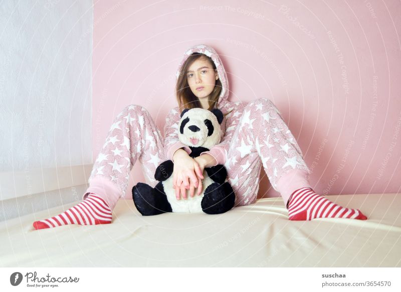 teenagers in pyjamas on the bed with cuddly toy Youth (Young adults) Pink Panda Bear Dress suit Pyjama teen bedroom youthful Puberty Being alone Sit Bed Earnest