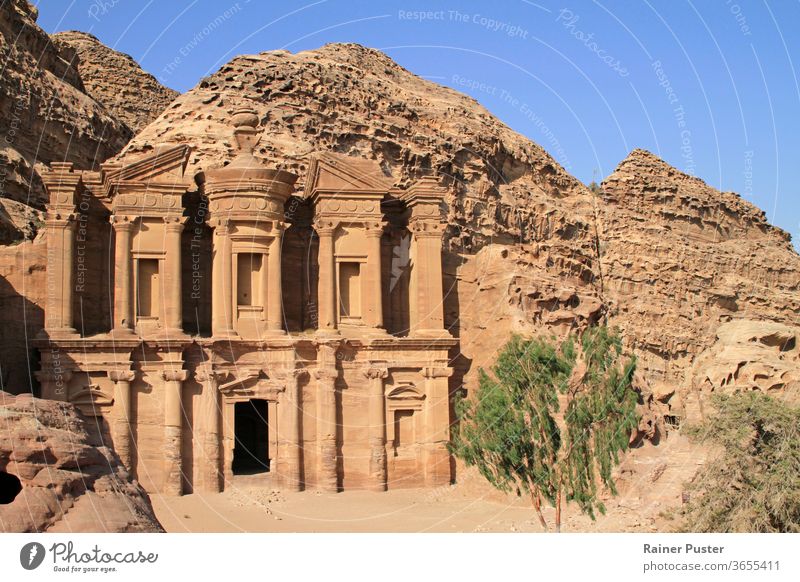 The Monastery - also known as Ad Deir - a monumental building carved out of rock in the ancient Jordanian city of Petra. ad deir archeology culture desert