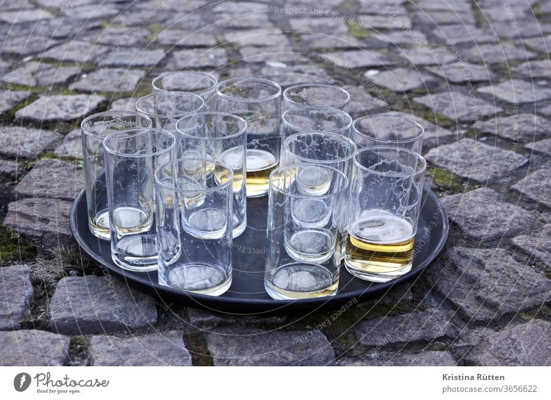 drunk beer glasses Beer glass Glazier Tray drinks Empty drunk up Pils Kölsch Old out Street Ground turned off Shooting match funfair Festival Street party