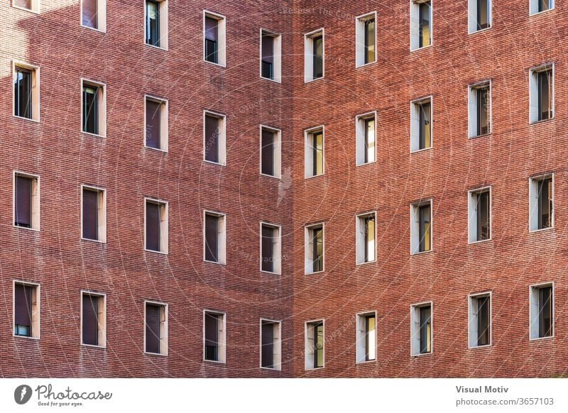Symmetrical facades of an old brick building structure Architecture abstract color windows bricks building facade urban urban facade exterior