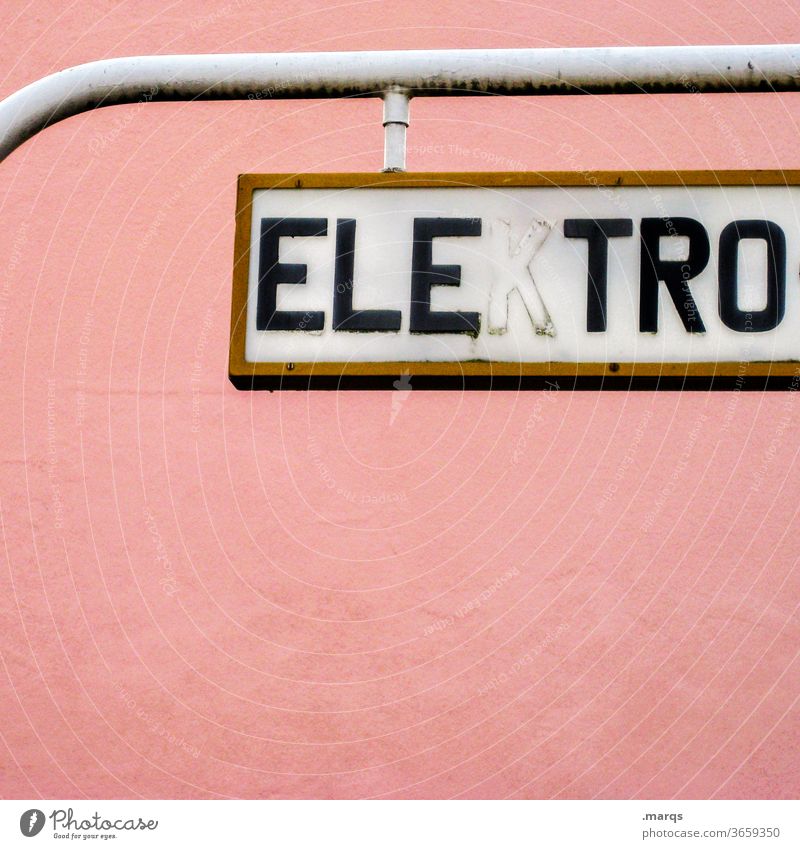 ELE TRO Electricity Electronics Signs and labeling Signage Pink Retail sector Characters Neutral Background
