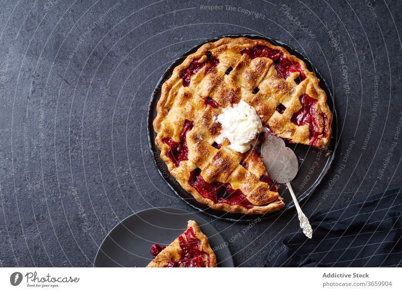 Top view image of cherry pie decorated with lattice thanksgiving food variety season autumn baking dinner seasonal round traditional closeup fresh cuisine table