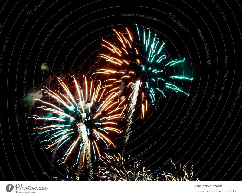 Colorful fireworks on dark background flash glow illuminate night sky colorful multicolored vibrant celebrate city event twilight carnival sparkle magic amazing