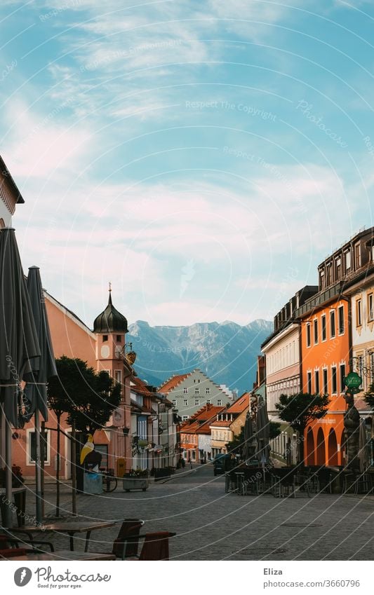Picturesque and idyllic pedestrian zone in Murnau with a view of the Alps Old town Bavaria pedestrian shades Downtown Town outlook upper market idyllically
