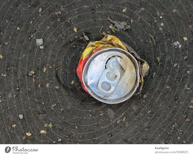 A flattened beverage can from a bird's eye view Tin Beverage Trash Metal Aluminium Deposit on cans Close-up Recycling Thirst Day Environmental pollution Dirty