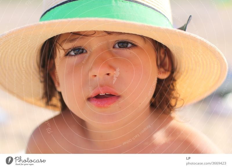 little girl wearing a hat Hat brim Girl Child Straw hat Exterior shot Summer Colour photo Human being Infancy Relaxation Vacation & Travel Nature