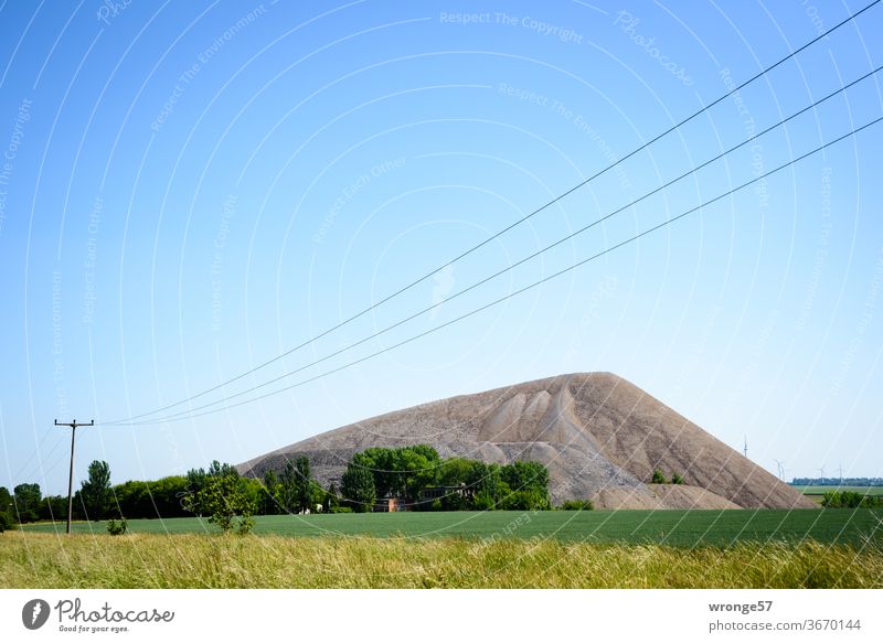 Mansfelder Revier | landscape with spoil heap and an overhead line running diagonally through the foreground of the picture Mansfeld Country Mansfeld district