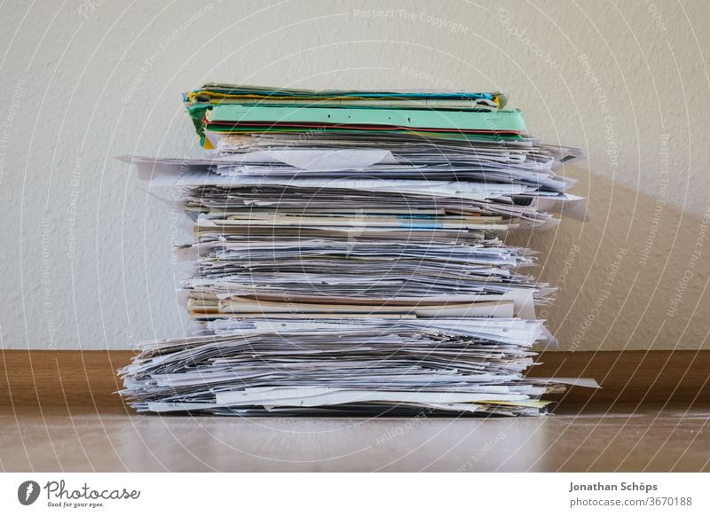 large stack of documents to sort out Academic Waste paper Work Ground office havoc Documents Stack of documents Stapler Home Office home office quantity