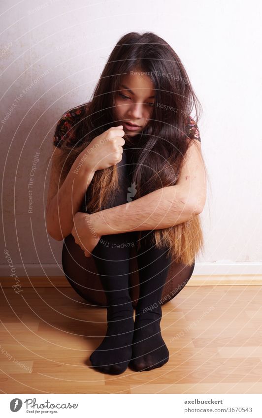 young woman with scars from self-harm depression self-injury girl sad cut hurt pain borderline auto-aggressive self-inflicted cutting sadness disorder stress