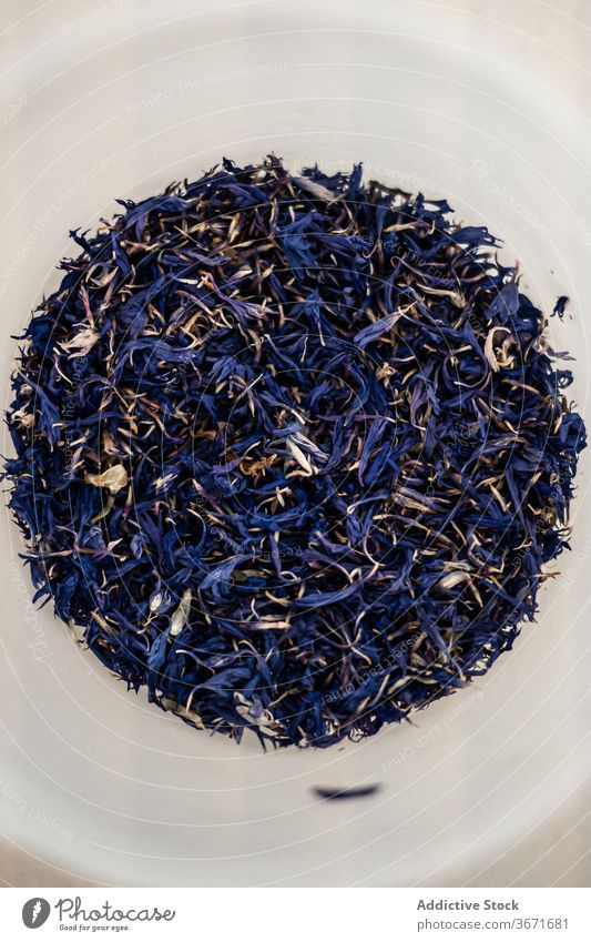 Cup with crop cornflower petals cup ceramic dried blue herb ingredient aroma heap mug flora natural pile season plant tea delicate tradition botany fragrant