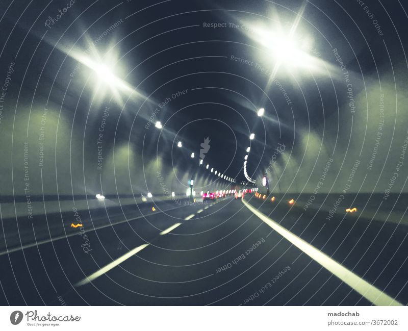 blinding lights Tunnel Driving Car Street Inverted toll Transport Highway Speed Light Road traffic Traffic infrastructure Logistics Movement Colour photo