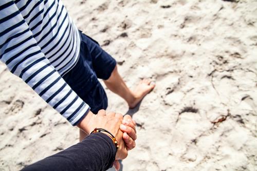 myself | because your hand fits in mine Joy Exterior shot Sand Feet To hold on Together Happy Family fortunate Fingers Emotions proximity in common Trust