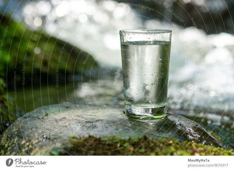fresh mountain water in a glass Water river nature freshness stream thirst summer season heat