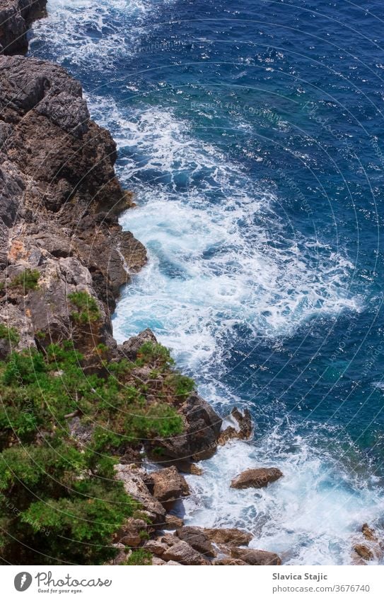 Aerial View Of A Rocky Coast water nature rock travel sea stone landscape ocean color above aerial aerial view background blue coast coastal coastline europe