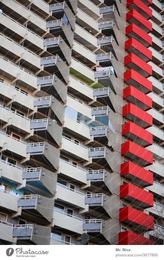 High-rise facade with balconies Balcony Red Architecture Prefab construction Manmade structures built Town Facade Tall skyscrapers urban Quarter Multistory
