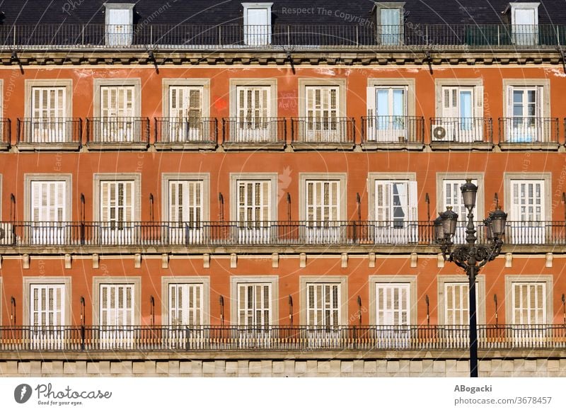 Historic Facade at Plaza Mayor in Madrid, Spain facade tenement house block building apartment windows madrid old europe exterior historic housing architecture