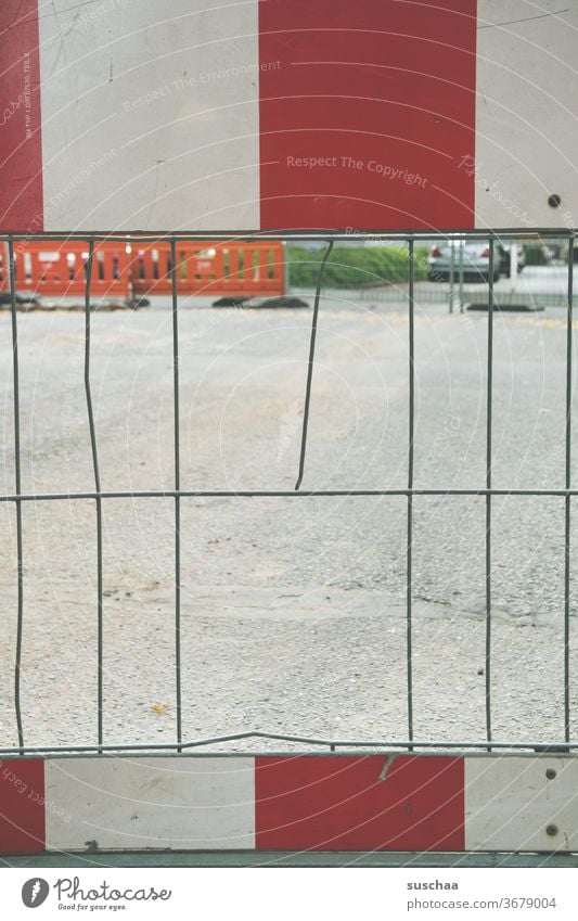 road barrier with hole in fence Street Town Lockdown Roadblock Road Blocking no passage Construction site Fence Hollow aborted iron grid Red White lattice bars
