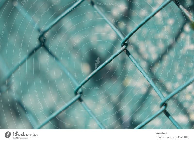 wire mesh, close Wire netting Wire netting fence little story cyan Garden fence Barrier Border Fence Screening Shallow depth of field Wire fence Near Detail