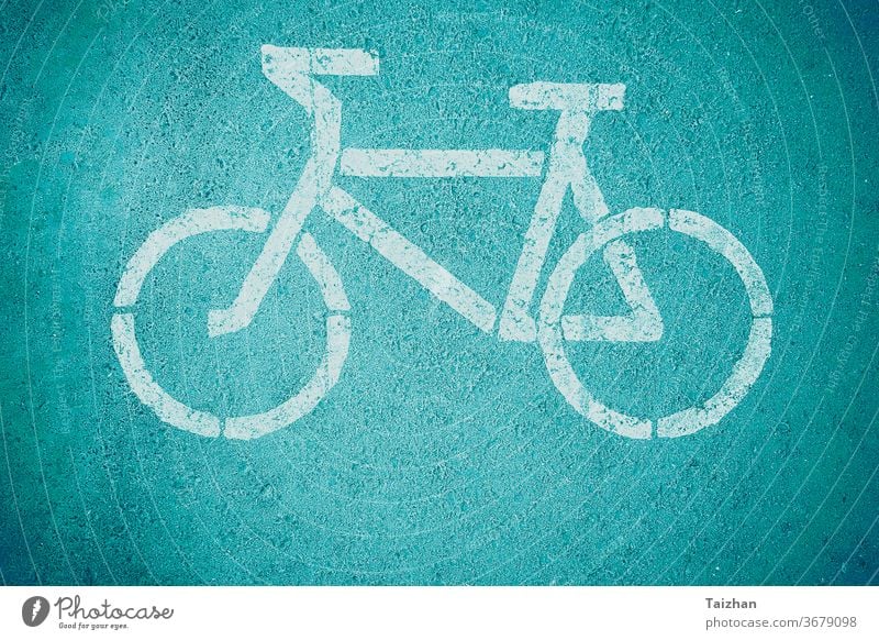 Bicycle road sign , close up . Toned direction path ride safety traffic transport transportation way bicycle bike route wheel cyclist lane white healthy line