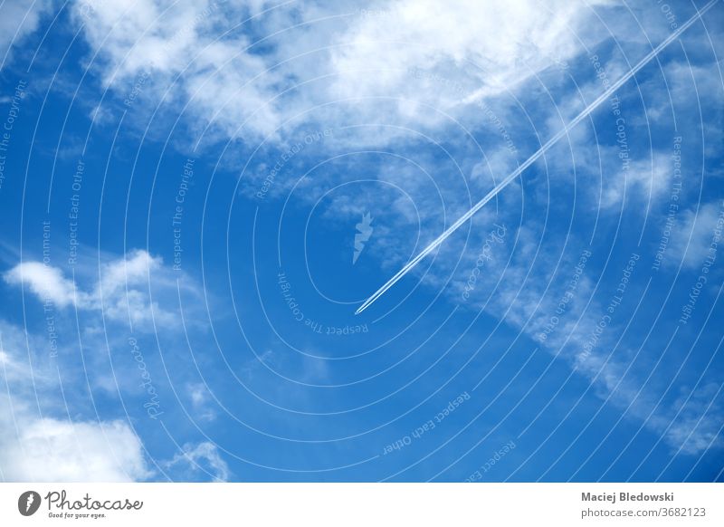 Beautiful sky with airplane contrails. blue flying cloudscape transportation jet condensation weather travel