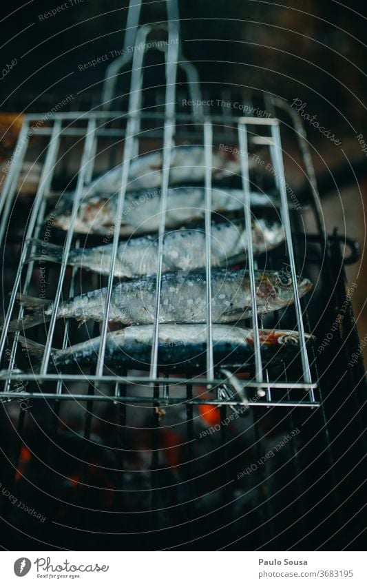 Grilling sardines Sardine Fish grilled grilling BBQ Barbecue (apparatus) Barbecue (event) Barbed wire Lisbon Exterior shot BBQ season Delicious Hot Day Food