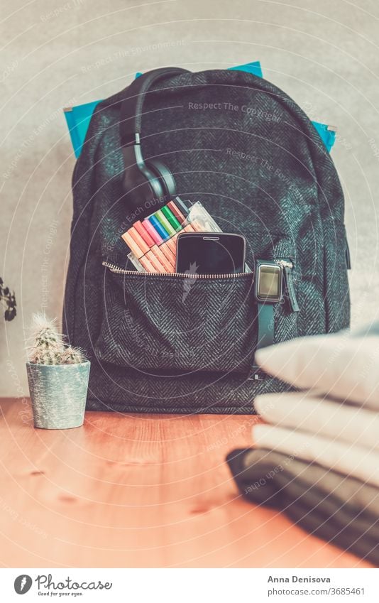 Back to school concept with uniform and electronic devices backpack back to school school uniform white shirt academy secondary a form rucksack book bag sweater