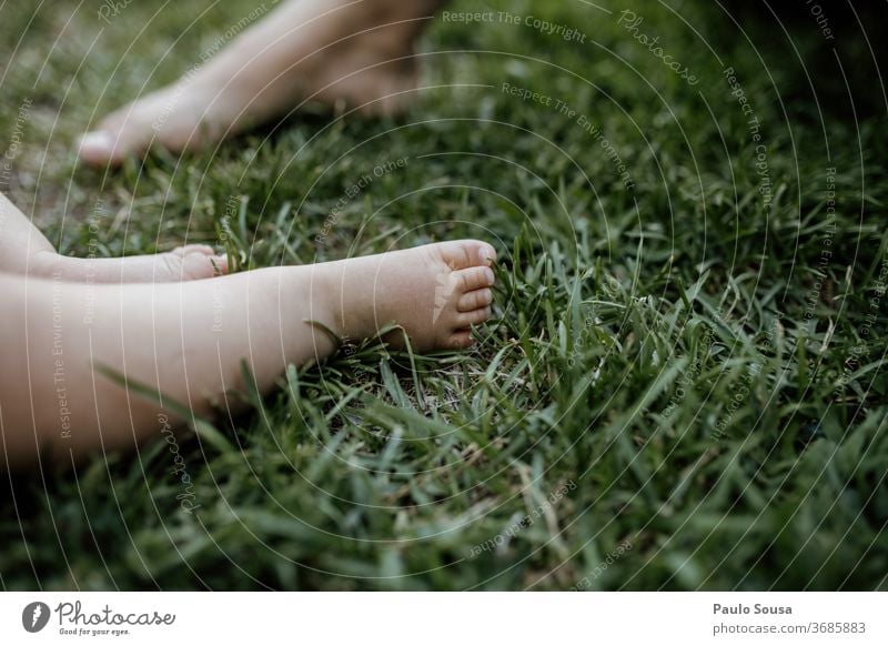 Close up baby feet on the grass Close-up human body part foot Human being Feet Skin Colour photo Body Toes Barefoot Baby 1 Relaxation Summer Adults Beautiful