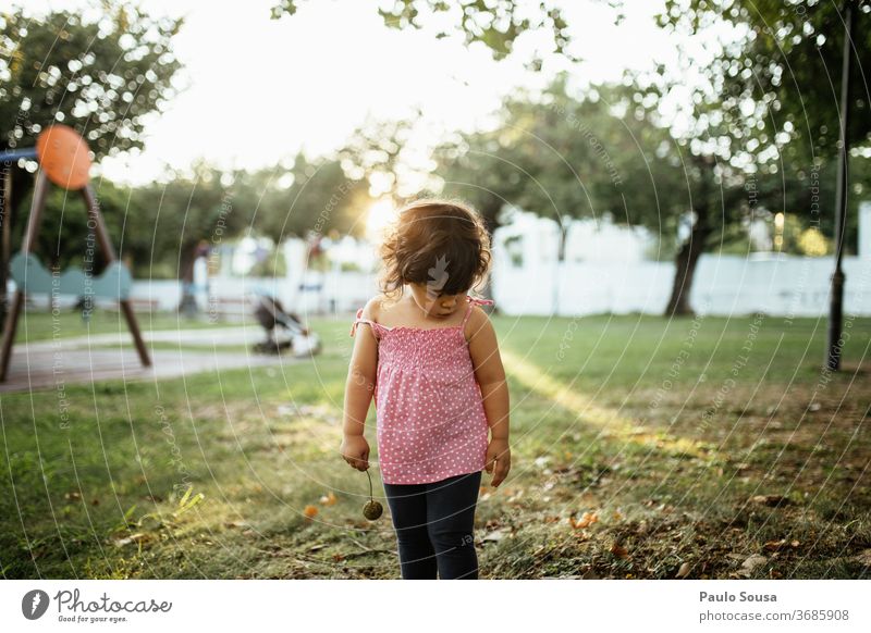 Little girl standing in playground Playground Park Girl Child childhood Caucasian 1 - 3 years Infancy Exterior shot Colour photo Toddler Cute