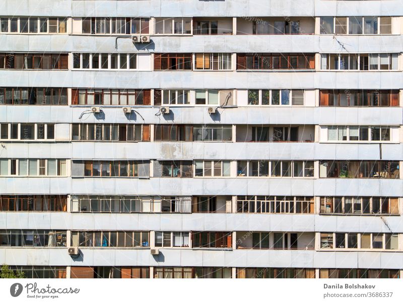 facade of multi-storey building with different balconies in residential area style reflect scene geometric steel center block downtown minimal row panel regular