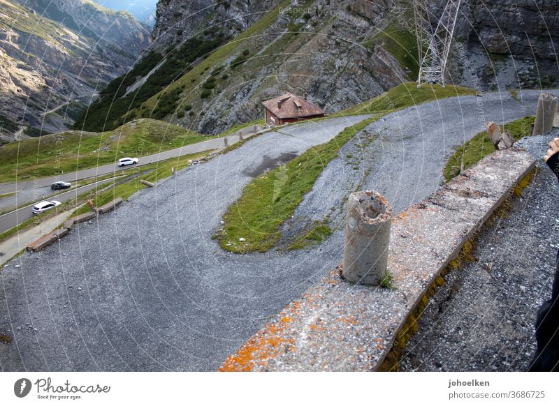 Old serpentine road in the high alps Winding road Alps High Alps pass road Tar Mountain Steep ascent Narrow curvaceous Curve Transport Street Landscape Nature