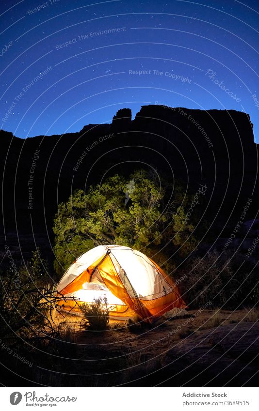 Camping tent in canyon at night camp mountain starry highland campsite travel illuminate usa united states america nature evening dark journey trip vacation