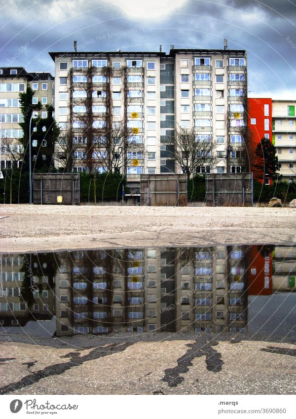 rent index Reflection Apartment Building Sky Puddle Mirror image Storm clouds Apartment house Rent