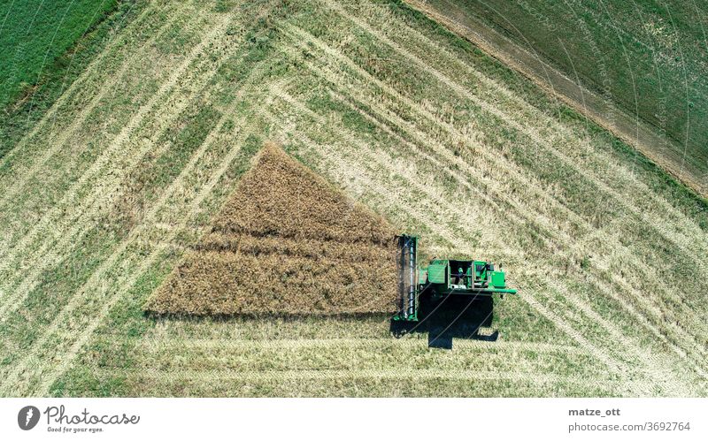 triangle harvest field agriculture combine harvester Field Agriculture Working in the fields Combine Tractor Triangle Harvest Reap Thresh Above