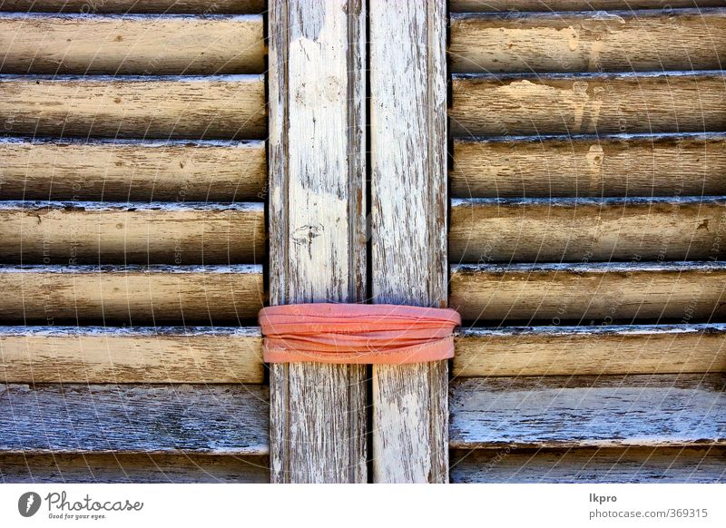 brown wood venetian blind and a pink rope in colon Rope Line Dirty Blue Brown Yellow Gray Green Pink Black White colonia del sacramento Uruguay Shutter window