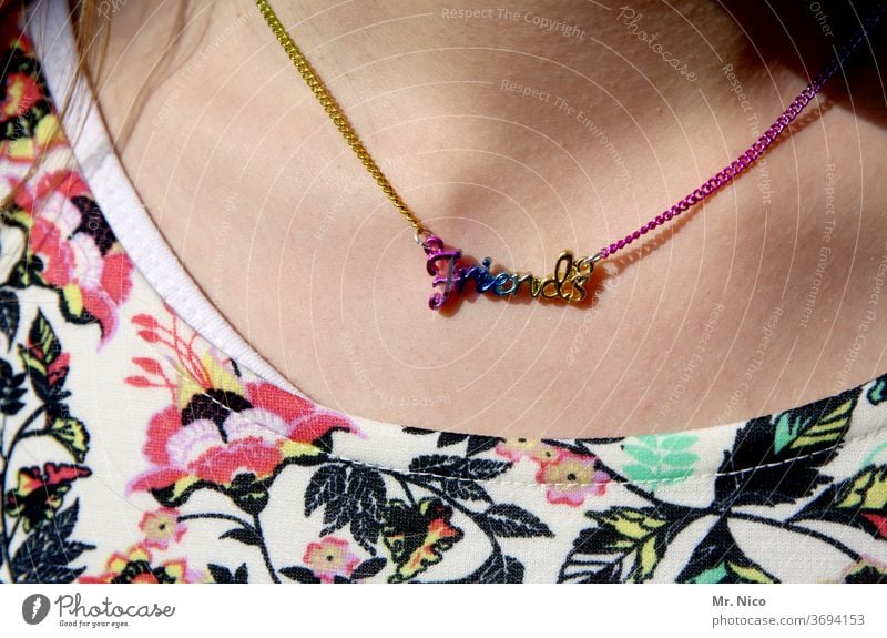 friendship Chain Jewellery Neck Necklace Skin variegated teenager girl Girlish youthful Lifestyle Yellow pink Close-up Detail Accessory Youth culture