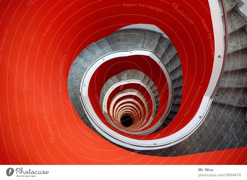 red staircase Stairs Downward Spiral Round Architecture Handrail Hollow Meandering Banister built Curve Vertigo Perspective Tall Story Upward Infinity