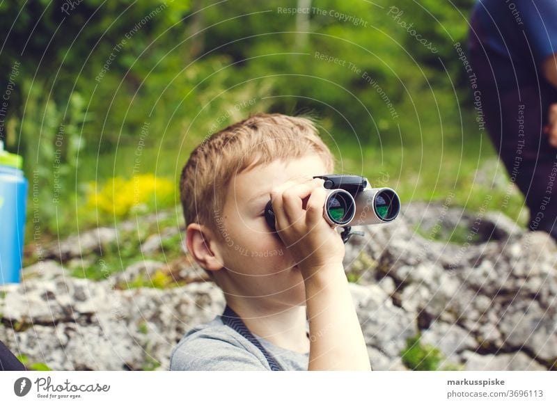 Boy with binoculars Boy (child) Child Infancy Adventure Discover explorers far vision Binoculars Future utopia Positive Optimism
